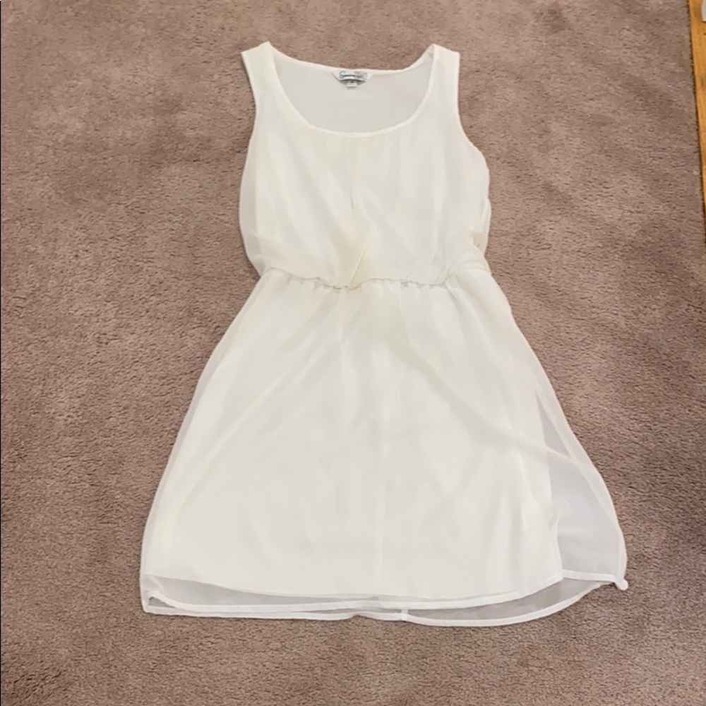 Women’s simple white strapped dress